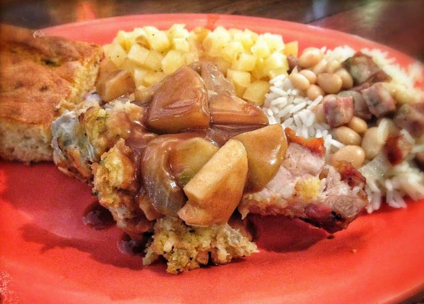 Cranberry Cornbread Stuffed Roast Pork Loin served with Rice with Navy Beans, Stewed Rutabagas, Cornbread and Cherries Jubilee