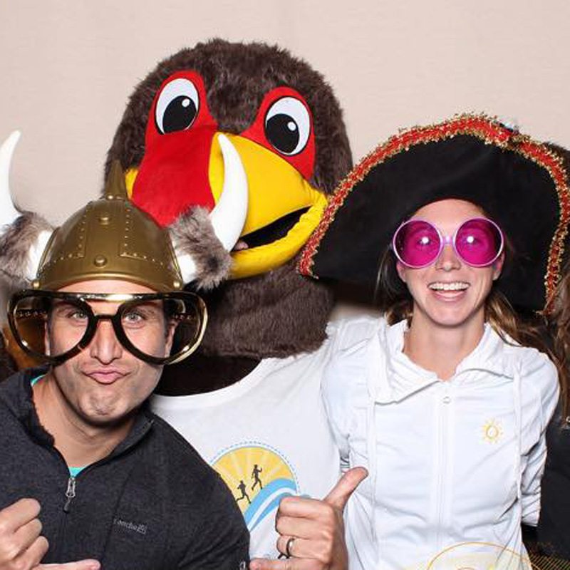 Founder of the 30A 10K Craig Baranowski and Amy Stoyles with Lucky the Turkey.