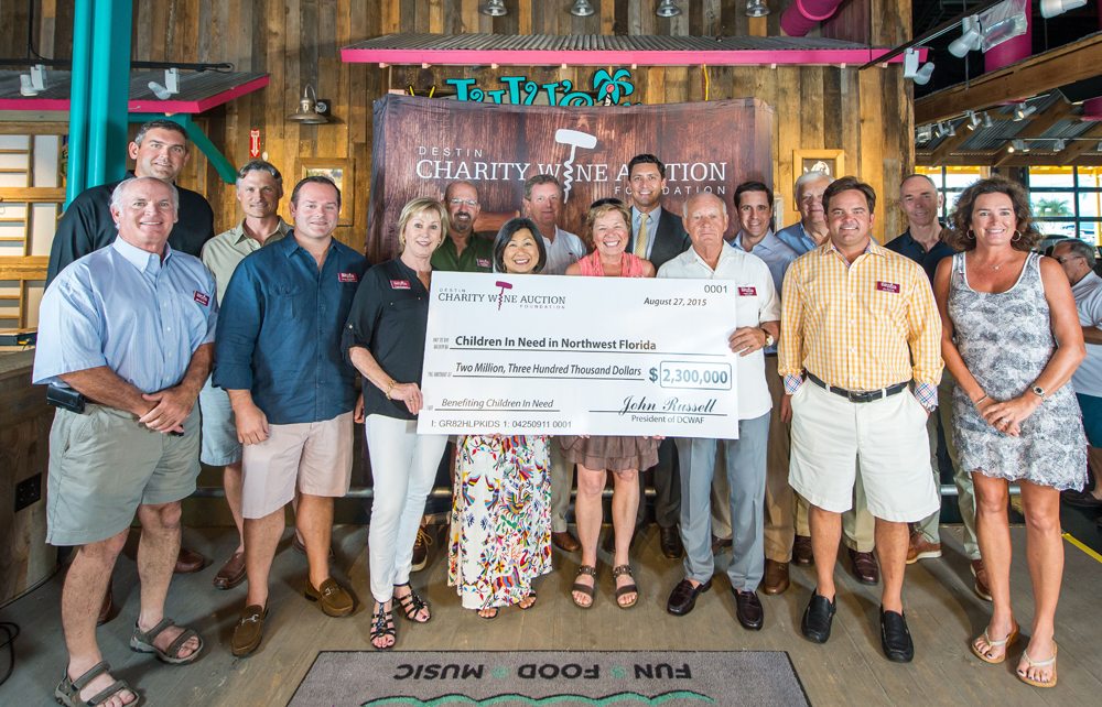 Destin Charity Wine Auction Foundation's Board of Directors at the check presentation ceremony at Lulu's in Destin.