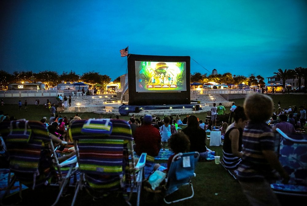 Relax and unwind with a movie on the lawn at Seaside's amphitheater. Photo by Jacqueline Ward Images