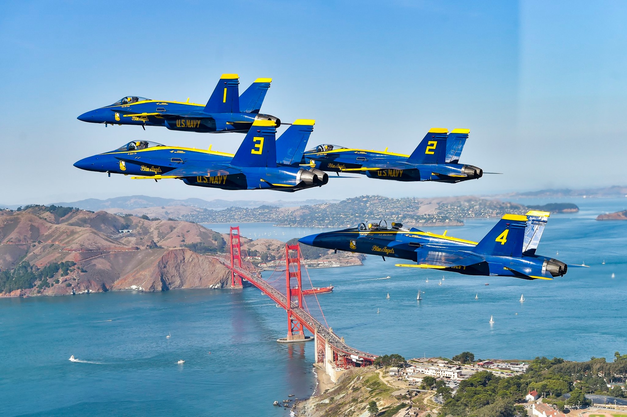 The Blue Angels fly over the Golden Gate Bridge in SF