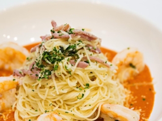 Borago's angel hair pasta with seared shrimp, prosciutto and garlic in a tomato cream sauce