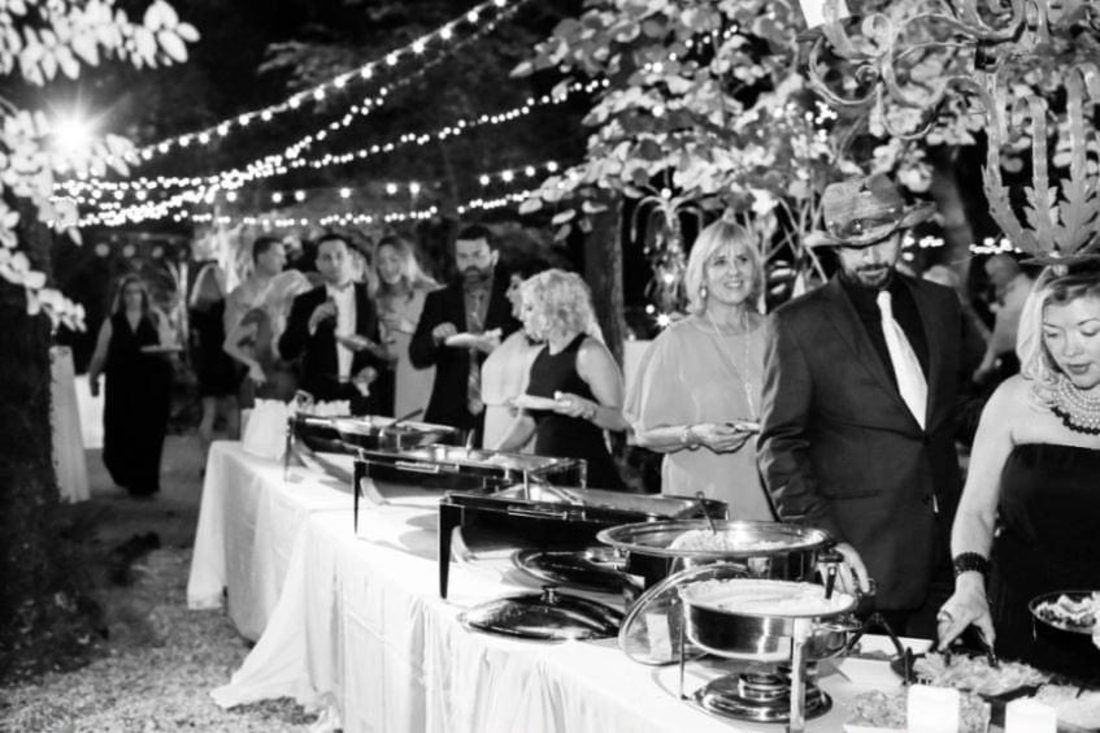 Wedding guests enjoying buffet line
