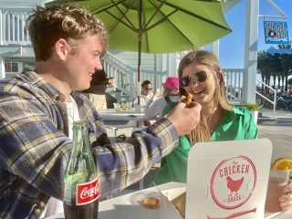 couple eating chicken shack