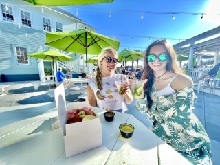 friends eating at container bar and chicken shack
