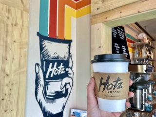 hotz coffee with sign